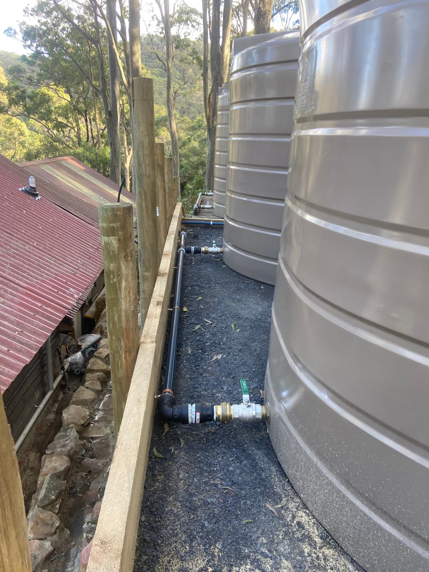 Rainwater tank, pump and filtration pipework installed at a Sydney home