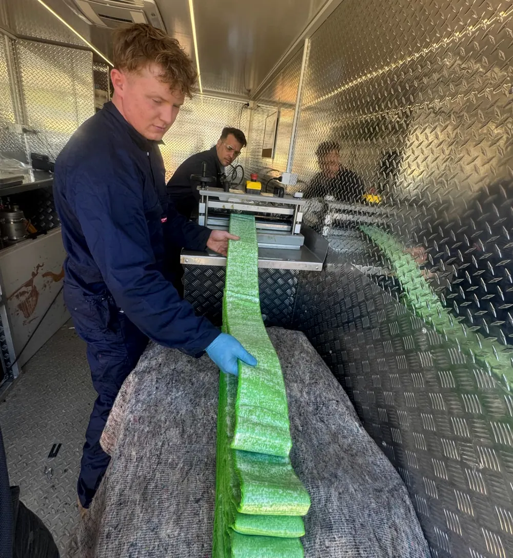 Pipe-relining inversion equipment, pressure gauges and controls in use during a drain repair
